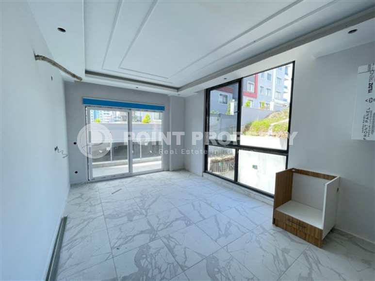 Apartment 1+1 with fine finishing in a house at the final stage of construction. The date for putting the facility into operation is May 2023.-id-4046-photo-4