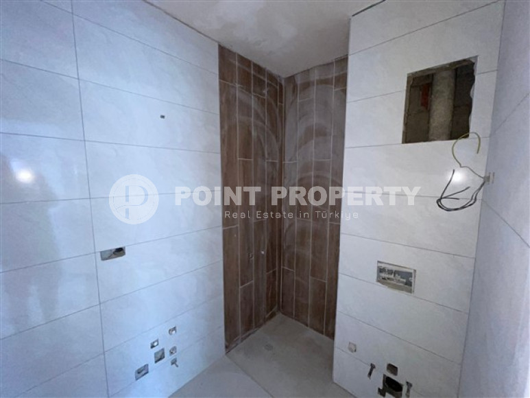 Apartment 1+1 with fine finishing in a house at the final stage of construction. The date for putting the facility into operation is May 2023.-id-4046-photo-5