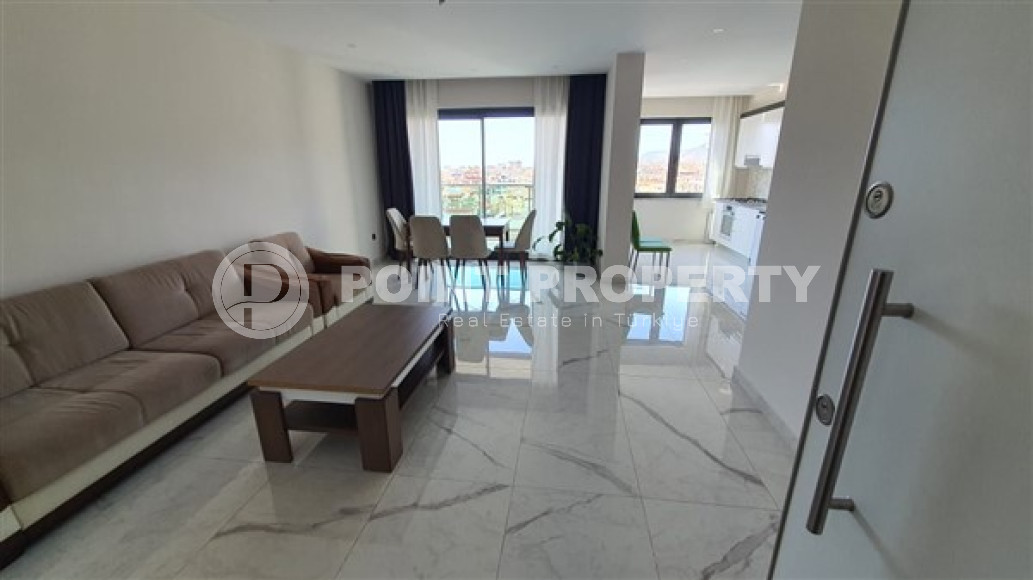 Beautiful 2+1 apartment in a building built in 2021 with new furniture and appliances.-id-4049-photo-1