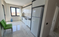 Beautiful 2+1 apartment in a building built in 2021 with new furniture and appliances.-id-4049-photo-2
