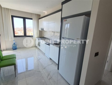 Beautiful 2+1 apartment in a building built in 2021 with new furniture and appliances.-id-4049-photo-2