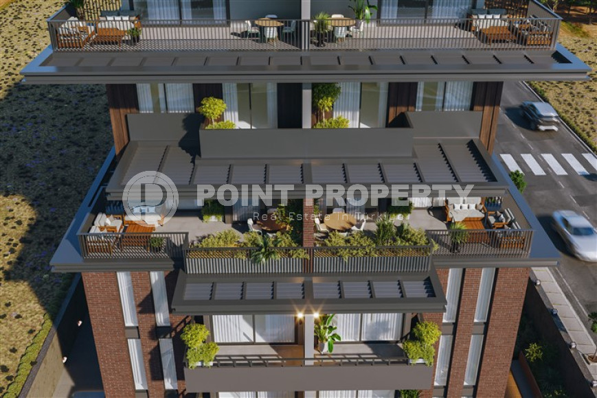 A beautiful boutique project under construction in the Kestel area, 150 meters from the sea. Apartments 60 - 205 m2.-id-4054-photo-2