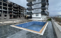 New 1+1 apartment with fine finishing in a promising, quiet area of Alanya Gazipasa.-id-4059-photo-9