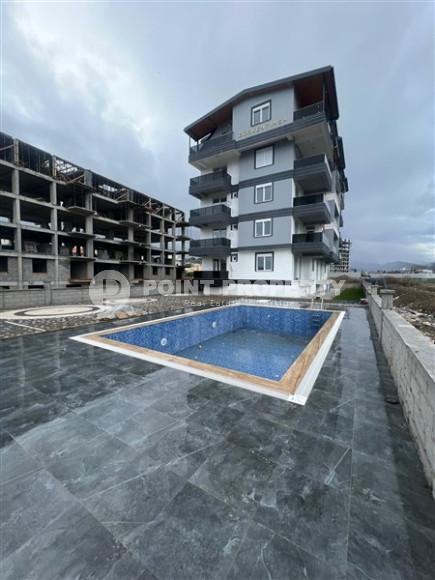 New 1+1 apartment with fine finishing in a promising, quiet area of Alanya Gazipasa.-id-4059-photo-9