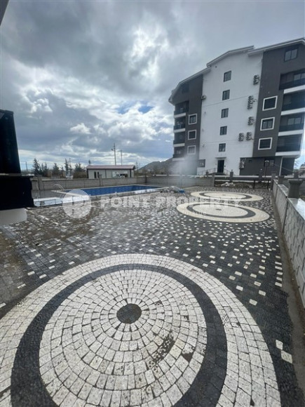 New 1+1 apartment with fine finishing in a promising, quiet area of Alanya Gazipasa.-id-4059-photo-11