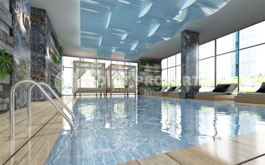 Уютная квартира планировкой 1+1 и площадью 65 м2 в элитном комплексе в районе Махмутлар, 1400 м от моря-id-1337-фото-11