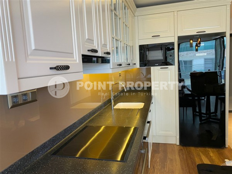 New furnished 1+1 apartment on the first line from the sea in the center of Kestel.-id-4071-photo-2