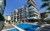 New furnished 1+1 apartment on the first line from the sea in the center of Kestel.-id-4071-photo-9