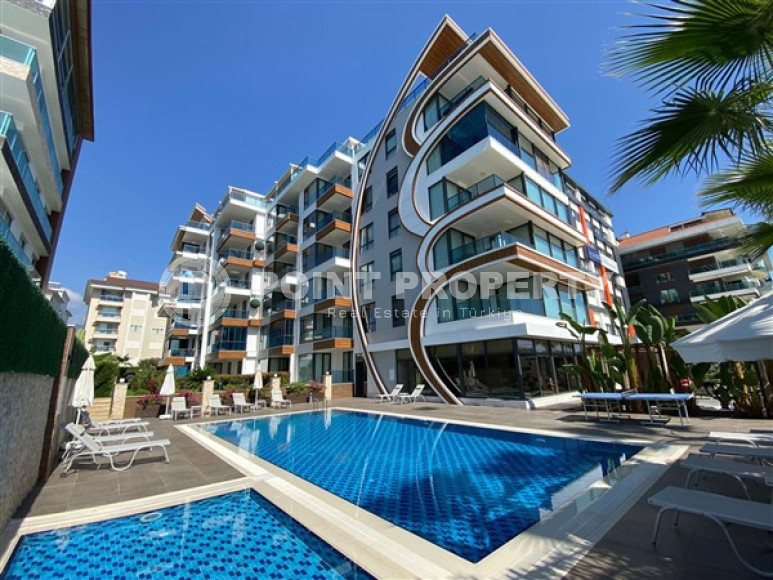 New furnished 1+1 apartment on the first line from the sea in the center of Kestel.-id-4071-photo-9