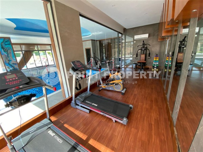 New furnished 1+1 apartment on the first line from the sea in the center of Kestel.-id-4071-photo-14