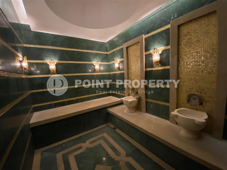 New furnished 1+1 apartment on the first line from the sea in the center of Kestel.-id-4071-photo-15