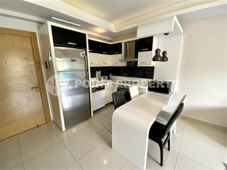 Stylish 1+1 apartment in a luxury residential complex with a water park, cinema, bowling alley, tennis court and SPA area.-id-4072-photo-4