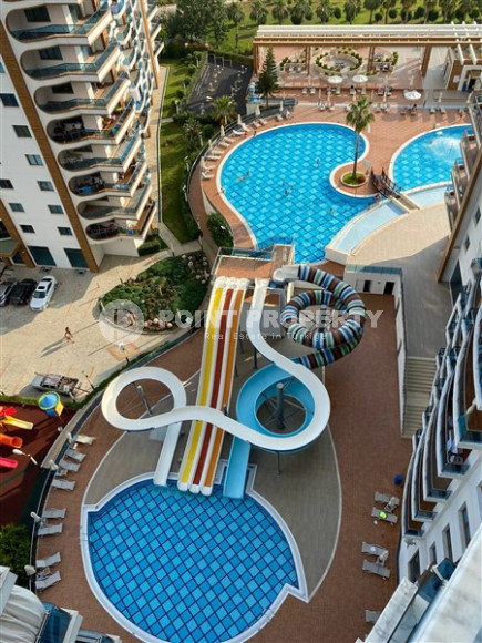 Stylish 1+1 apartment in a luxury residential complex with a water park, cinema, bowling alley, tennis court and SPA area.-id-4072-photo-8