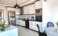 Stylish modern 4+1 apartment on the 9th floor with panoramic views of the city and the sea.-id-4074-photo-2