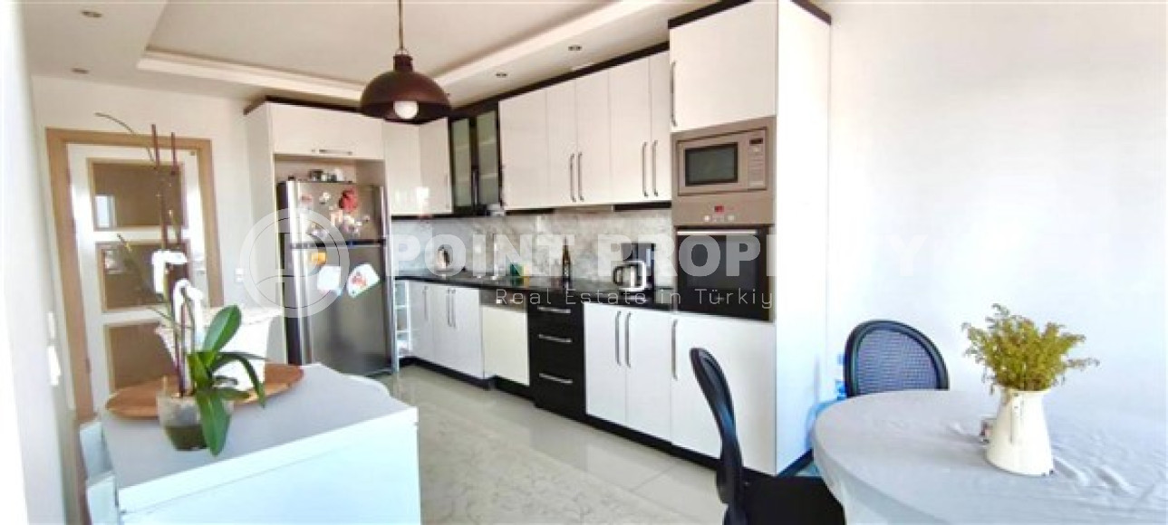 Stylish modern 4+1 apartment on the 9th floor with panoramic views of the city and the sea.-id-4074-photo-2