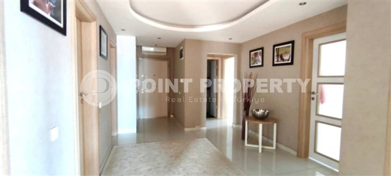 Stylish modern 4+1 apartment on the 9th floor with panoramic views of the city and the sea.-id-4074-photo-3