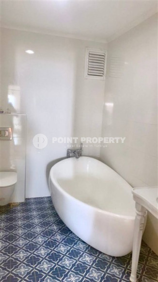 Stylish modern 4+1 apartment on the 9th floor with panoramic views of the city and the sea.-id-4074-photo-8