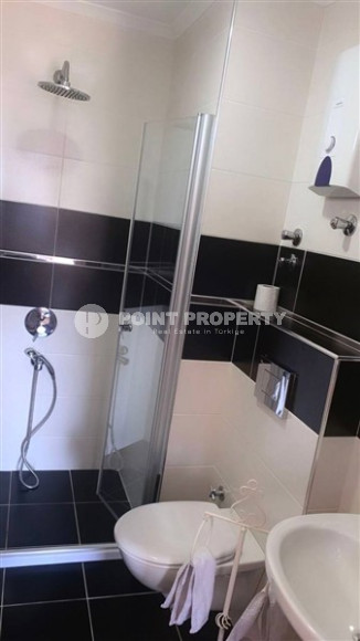 Stylish modern 4+1 apartment on the 9th floor with panoramic views of the city and the sea.-id-4074-photo-9