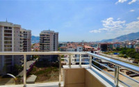 Stylish modern 4+1 apartment on the 9th floor with panoramic views of the city and the sea.-id-4074-photo-10