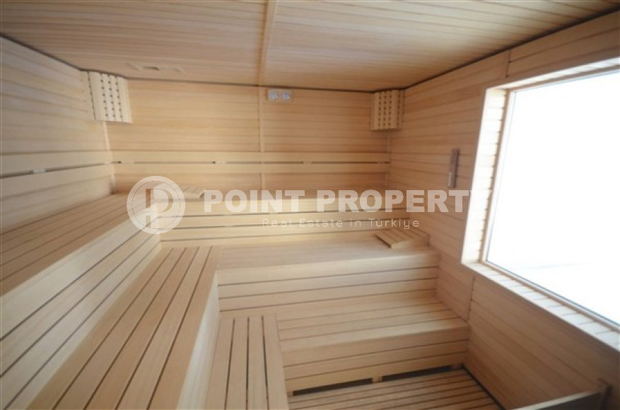 Stylish modern 4+1 apartment on the 9th floor with panoramic views of the city and the sea.-id-4074-photo-18