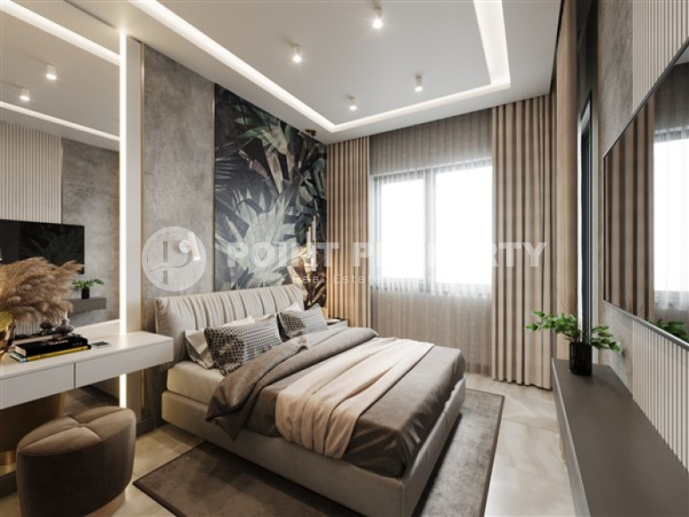 New project - apartments and duplexes on different floors in a building under construction in the prestigious Upper Oba area of Alanya.-id-4079-photo-9