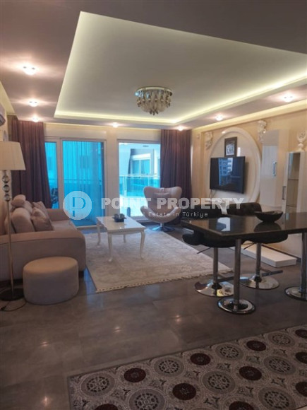 Современная квартира 1+1, общей площадью 70 м2, в 150 метрах от моря в центре района Кестель.-id-4081-фото-4