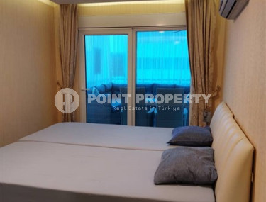 Современная квартира 1+1, общей площадью 70 м2, в 150 метрах от моря в центре района Кестель.-id-4081-фото-5