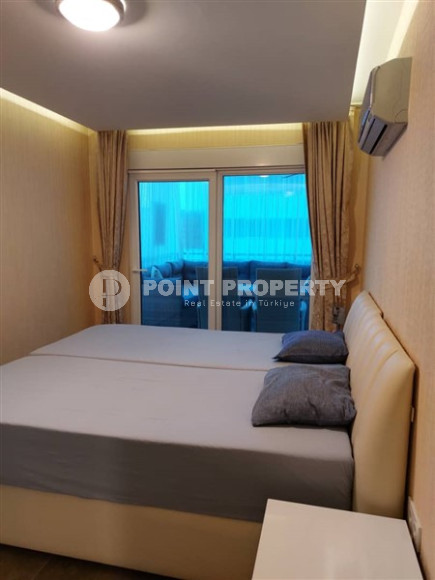 Современная квартира 1+1, общей площадью 70 м2, в 150 метрах от моря в центре района Кестель.-id-4081-фото-5