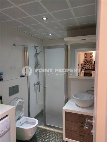 Современная квартира 1+1, общей площадью 70 м2, в 150 метрах от моря в центре района Кестель.-id-4081-фото-7