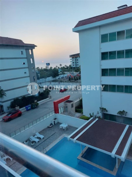 Современная квартира 1+1, общей площадью 70 м2, в 150 метрах от моря в центре района Кестель.-id-4081-фото-11