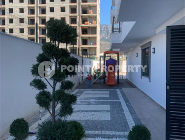 New 2+1 apartment with an area of 125 m2 at the stage of completion of finishing works, Mahmutlar district-id-4087-photo-2