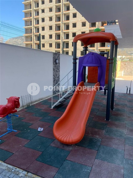 New 2+1 apartment with an area of 125 m2 at the stage of completion of finishing works, Mahmutlar district-id-4087-photo-3