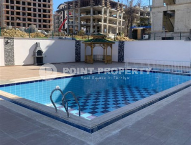 New 2+1 apartment with an area of 125 m2 at the stage of completion of finishing works, Mahmutlar district-id-4087-photo-4