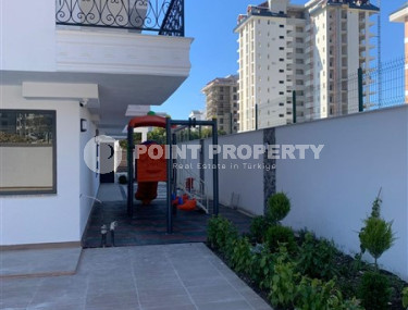 New 2+1 apartment with an area of 125 m2 at the stage of completion of finishing works, Mahmutlar district-id-4087-photo-5