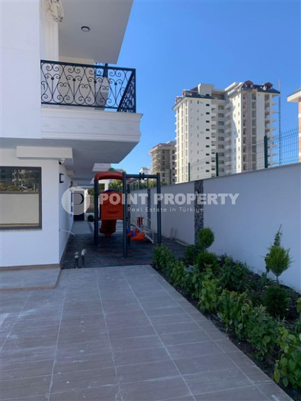 New 2+1 apartment with an area of 125 m2 at the stage of completion of finishing works, Mahmutlar district-id-4087-photo-5