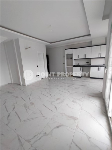 New 2+1 apartment with an area of 125 m2 at the stage of completion of finishing works, Mahmutlar district-id-4087-photo-10