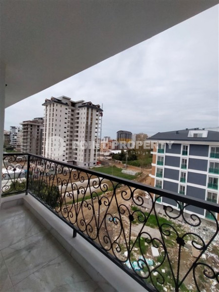 New 2+1 apartment with an area of 125 m2 at the stage of completion of finishing works, Mahmutlar district-id-4087-photo-11