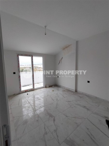 New 2+1 apartment with an area of 125 m2 at the stage of completion of finishing works, Mahmutlar district-id-4087-photo-12