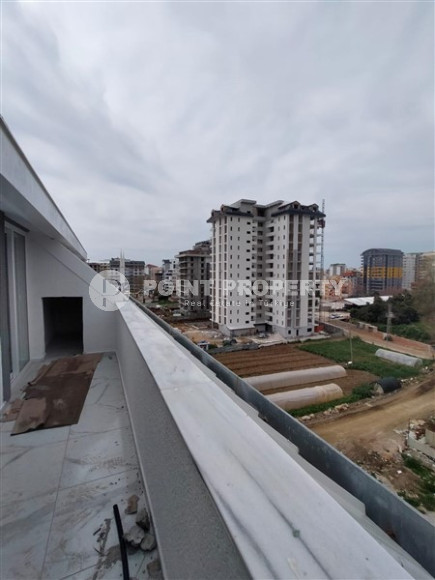 New 2+1 apartment with an area of 125 m2 at the stage of completion of finishing works, Mahmutlar district-id-4087-photo-13