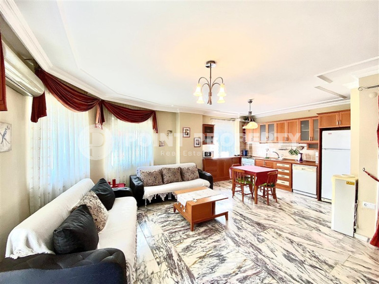 Well-maintained apartment with an area of 100 m2 in the very center of Alanya. Sold furnished.-id-4088-photo-1