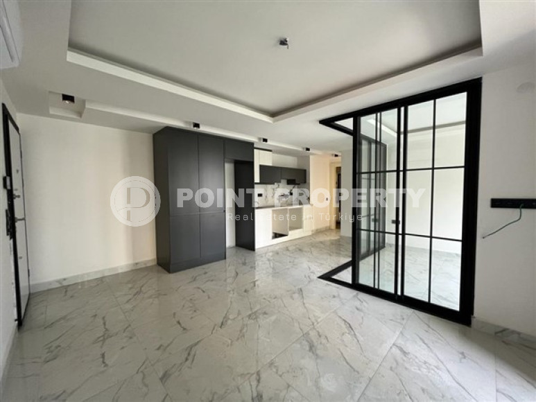 New apartments with high-quality renovation in a residence built in 2021, Alanya center-id-4091-photo-1