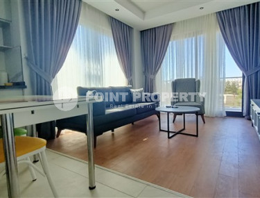 Уютная современная квартира 1+1 с новой мебелью и бытовой техникой в 500 метрах от знаменитого пляжа Клеопатры.-id-4098-фото-2