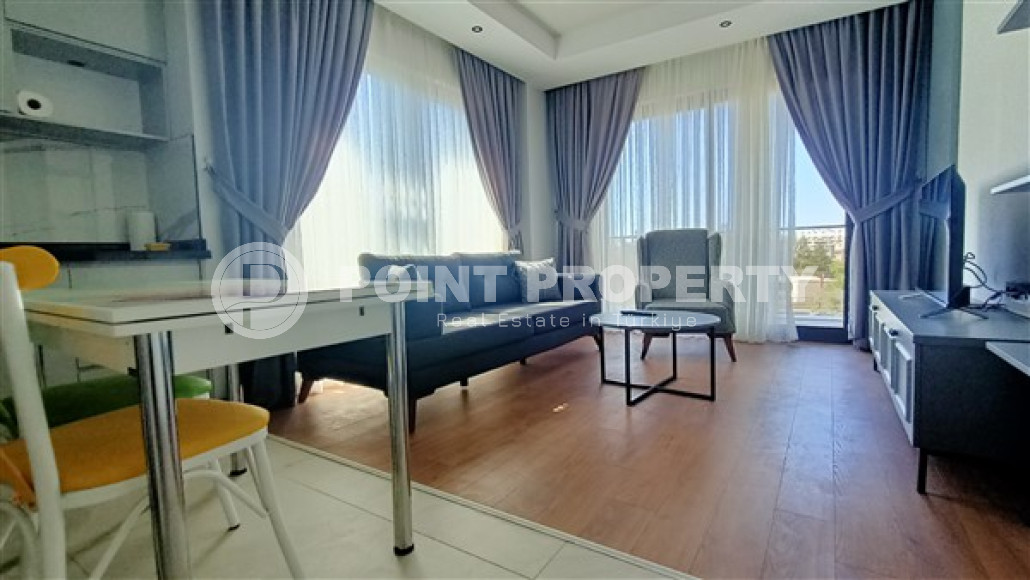 Уютная современная квартира 1+1 с новой мебелью и бытовой техникой в 500 метрах от знаменитого пляжа Клеопатры.-id-4098-фото-2