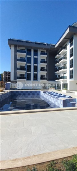 Уютная двухкомнатная квартира 50 м2 в новой резиденции на удалении от моря, район Оба-id-4106-фото-2