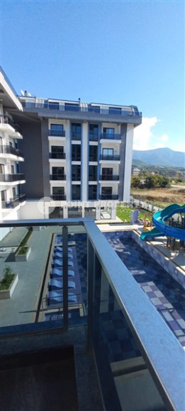 Уютная двухкомнатная квартира 50 м2 в новой резиденции на удалении от моря, район Оба-id-4106-фото-6