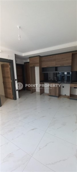 Уютная двухкомнатная квартира 50 м2 в новой резиденции на удалении от моря, район Оба-id-4106-фото-9