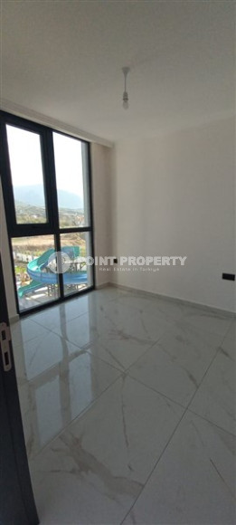 Уютная двухкомнатная квартира 50 м2 в новой резиденции на удалении от моря, район Оба-id-4106-фото-11