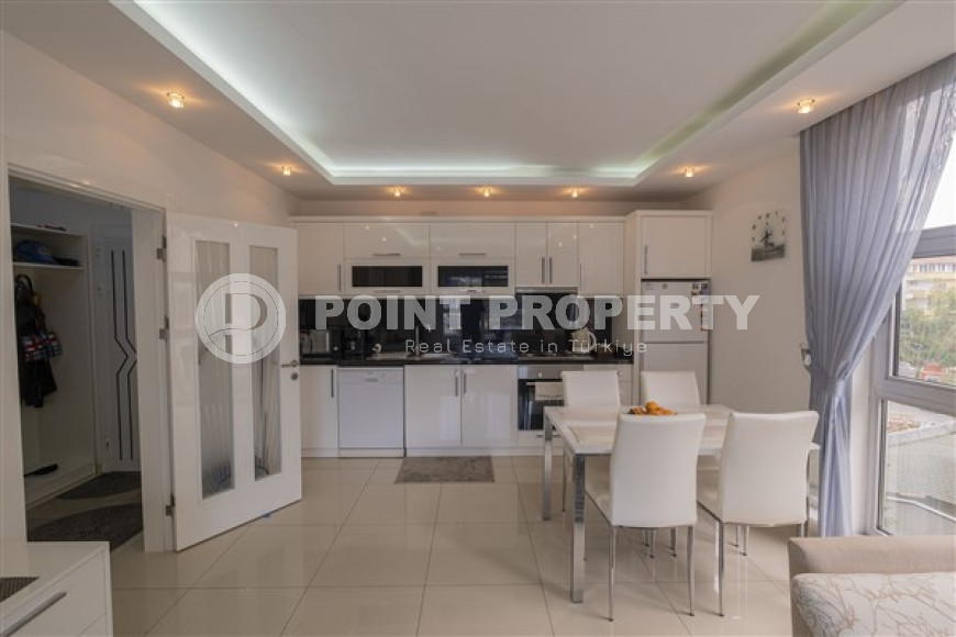 Светлая современная квартира 1+1 в 200 метрах от роскошного пляжа Клеопатры.-id-4113-фото-2