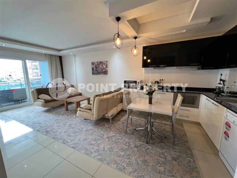 A small furnished 1+1 apartment in a luxury residential complex with the most developed leisure infrastructure. Description:-id-4116-photo-1