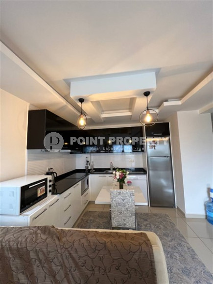 A small furnished 1+1 apartment in a luxury residential complex with the most developed leisure infrastructure. Description:-id-4116-photo-3